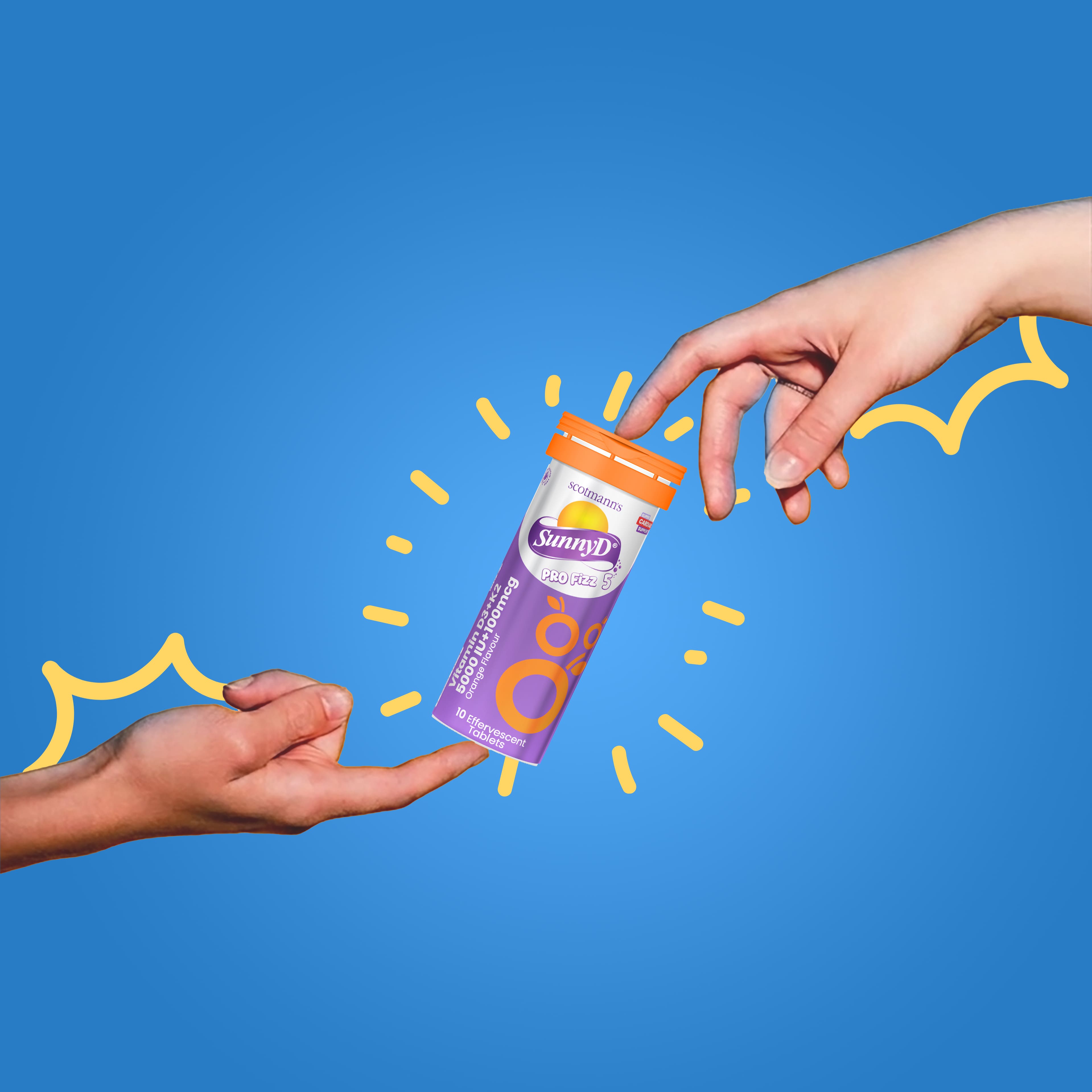 Two hands reaching towards a SunnyD drink container against a blue background